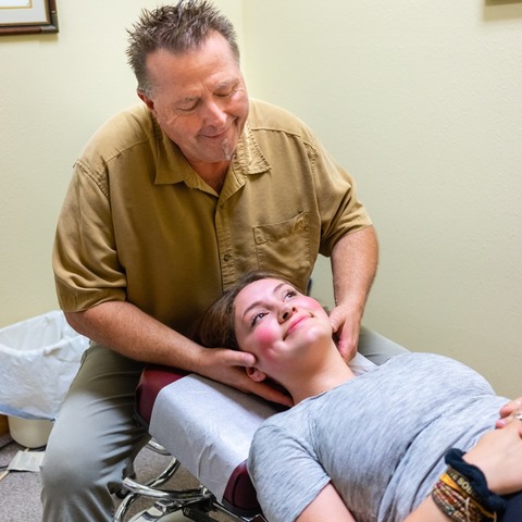 Dr. Bittner adjusting a patient at Able Chiropractic in Bozeman